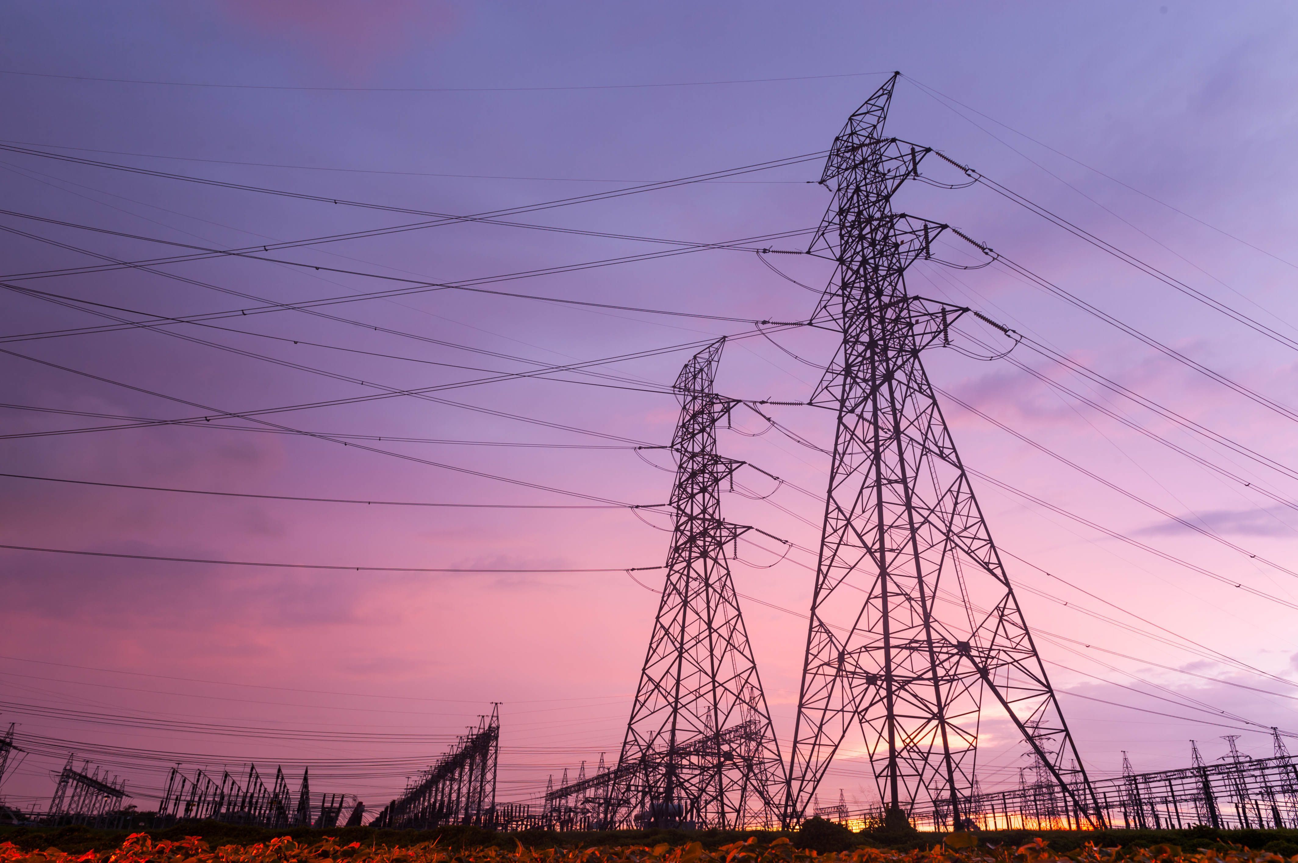 I Stock 517272902 electricity towers sunset